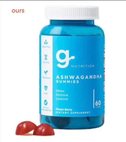 Blue bottle of gNutrition Ashwagandha gummies with two red gummies on a white background.