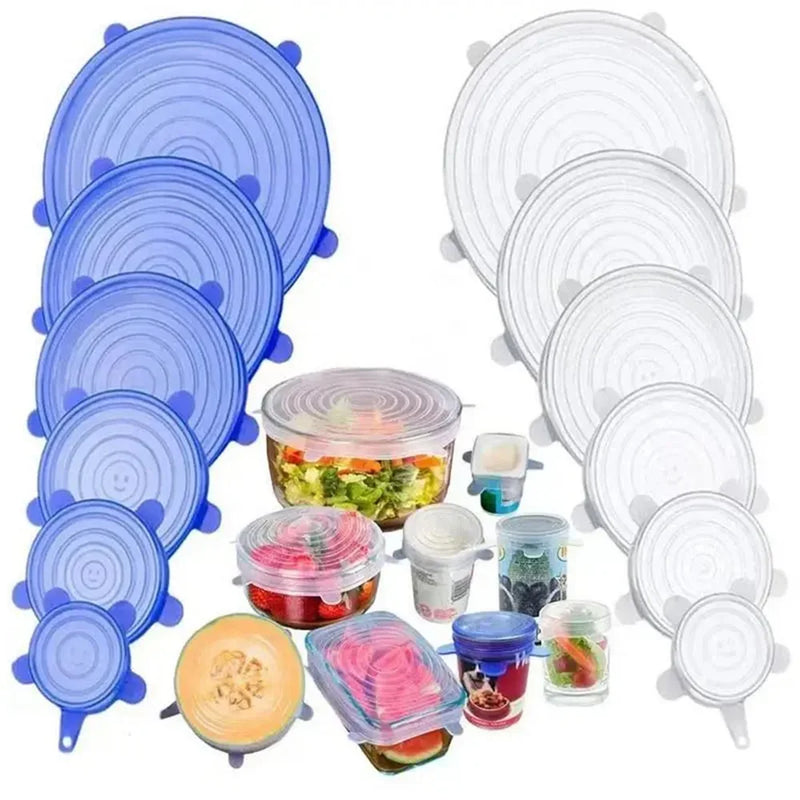 Set of blue and clear silicone food covers on a white background