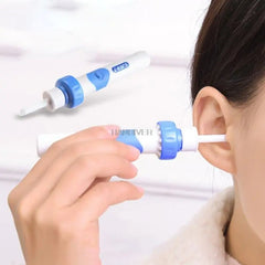 Person demonstrating using a white and blue tool ear cleaning suction device